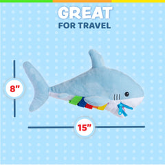Six colorful buckles with clasps on Bruce Shark for tactile play.