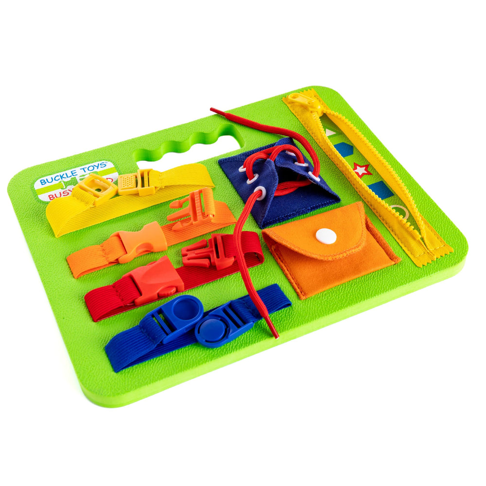 Buckle Toys Busy Board snap pocket for grip and finger control