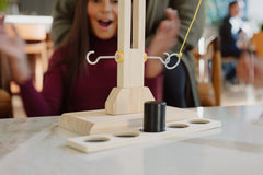 Buffalo Games Hook and Ring Battle scoring ladder emphasizes fast decisions.