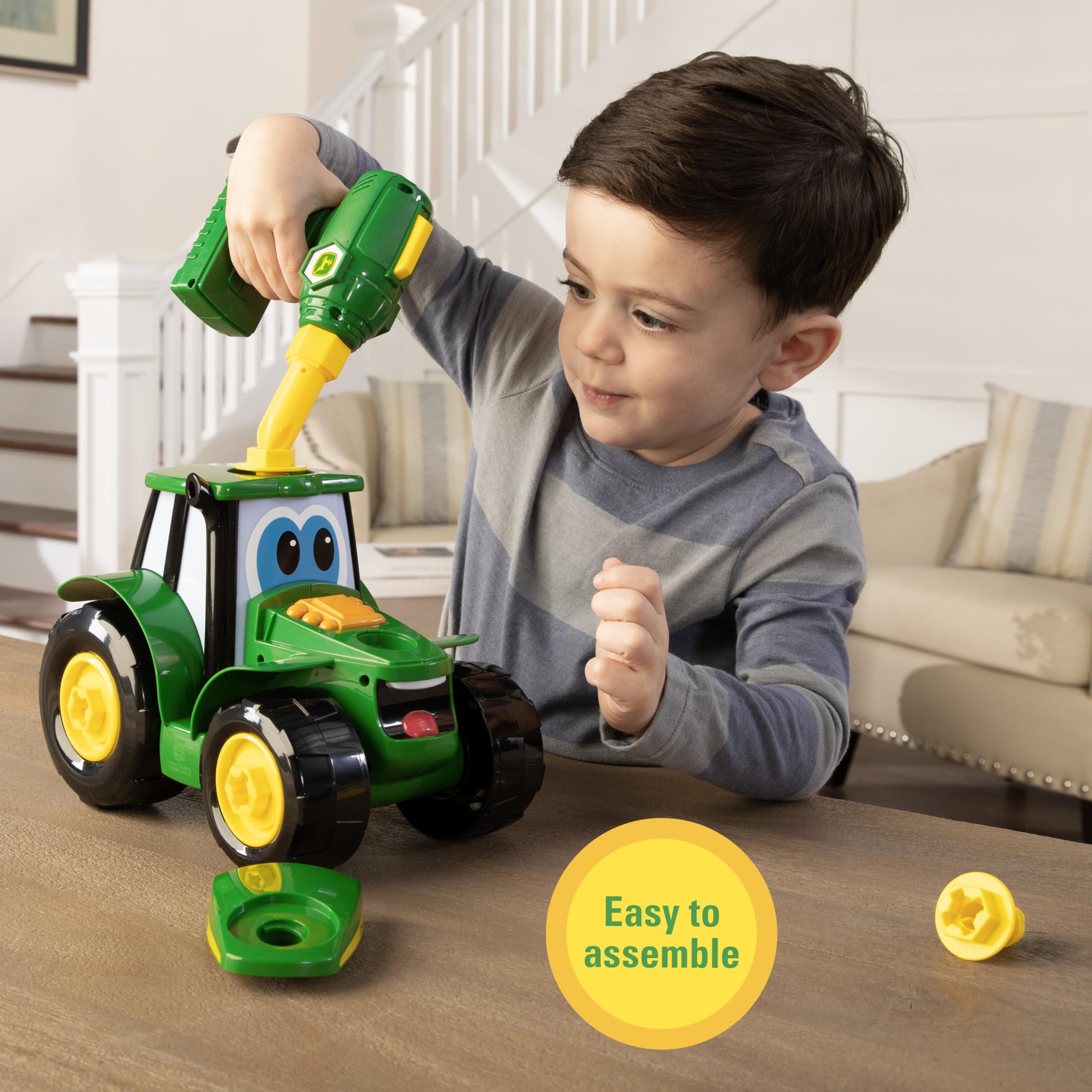 Bright colors on the John Deere tractor toy spark toddler play.