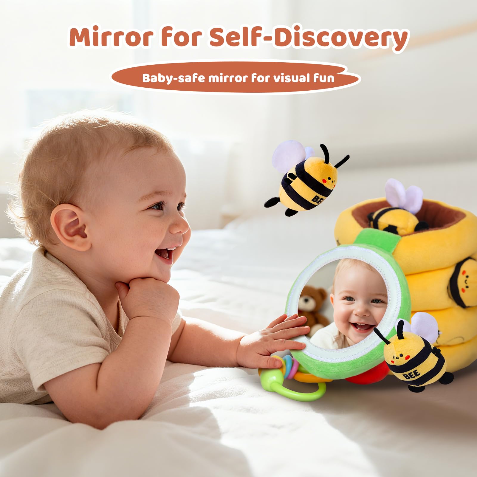 BUMBELIN mirror lid rattle handle invites visual tracking and play.