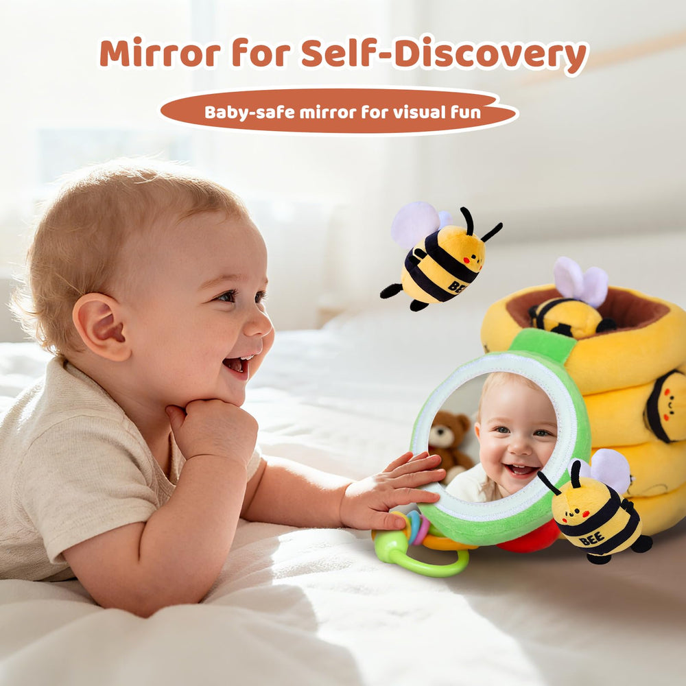 BUMBELIN mirror lid rattle handle invites visual tracking and play.