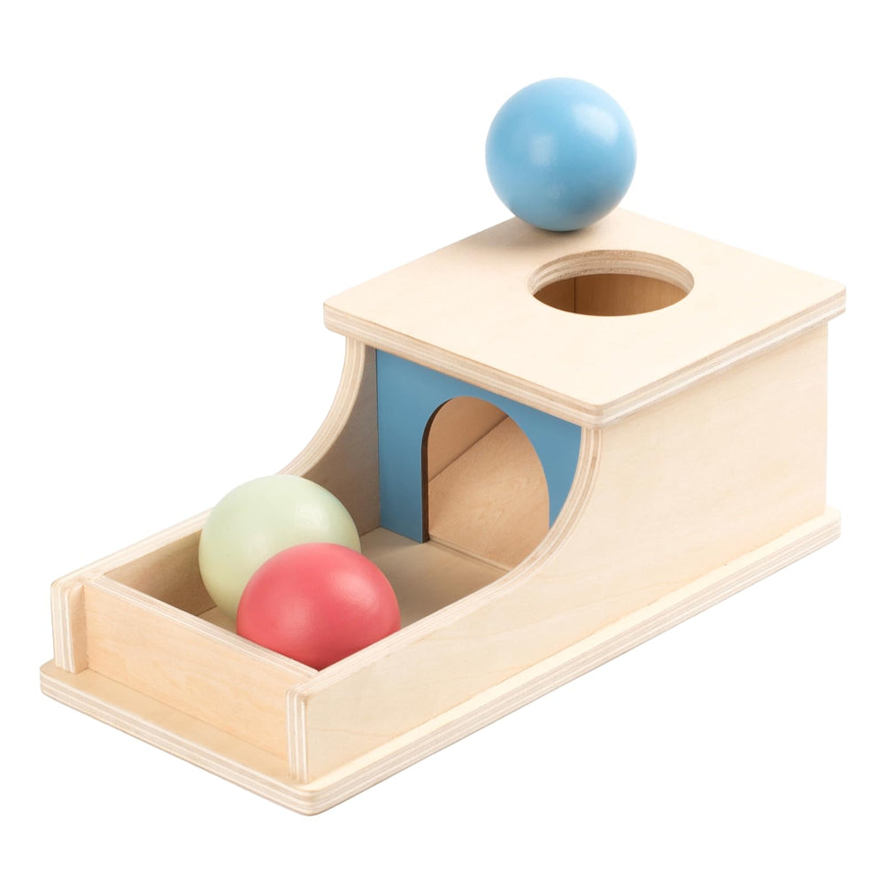 Busy Edition object permanence box front view with three balls for early problem-solving.