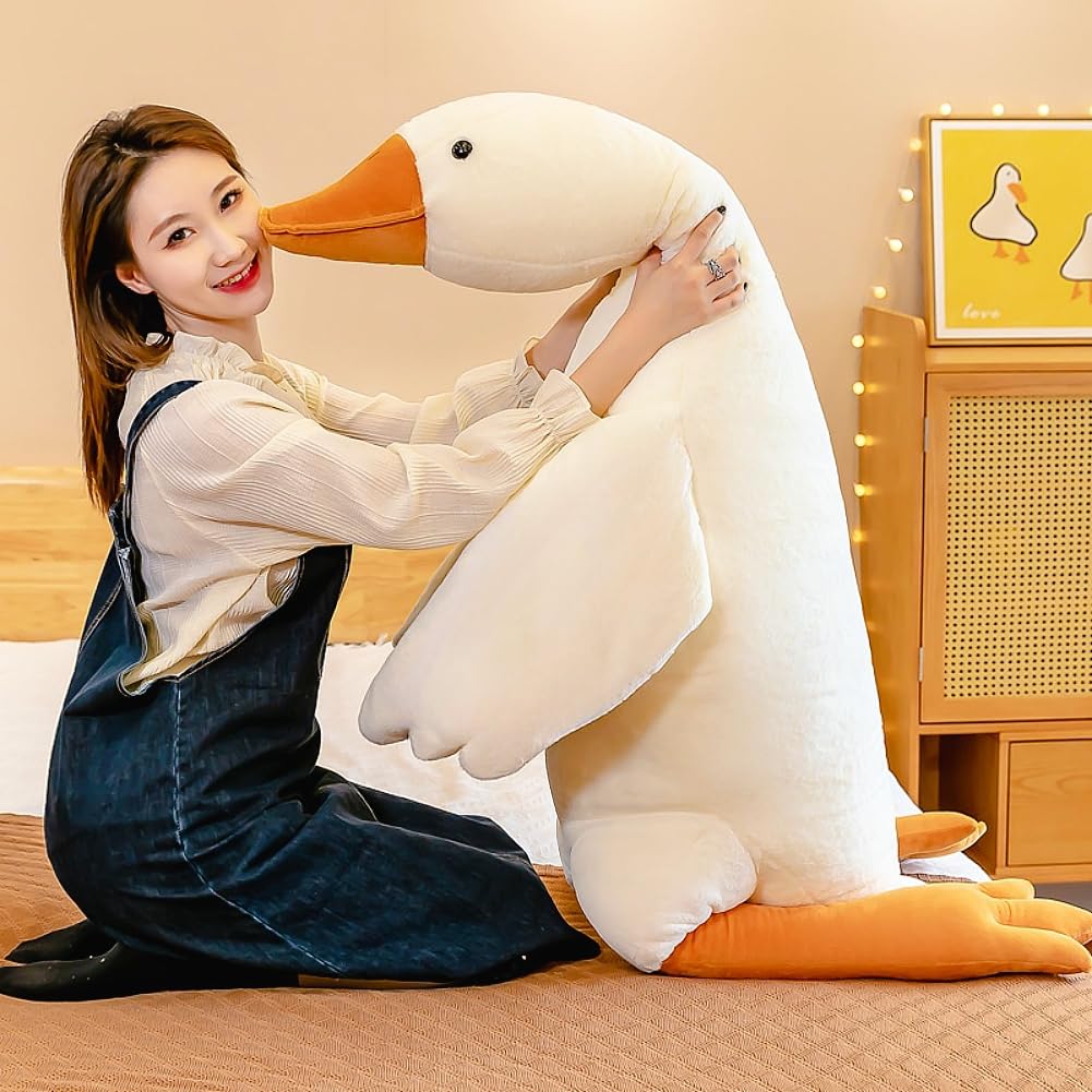 BXEBUI goose on sofa adds playful decor and conversation starter.