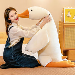 BXEBUI goose on sofa adds playful decor and conversation starter.