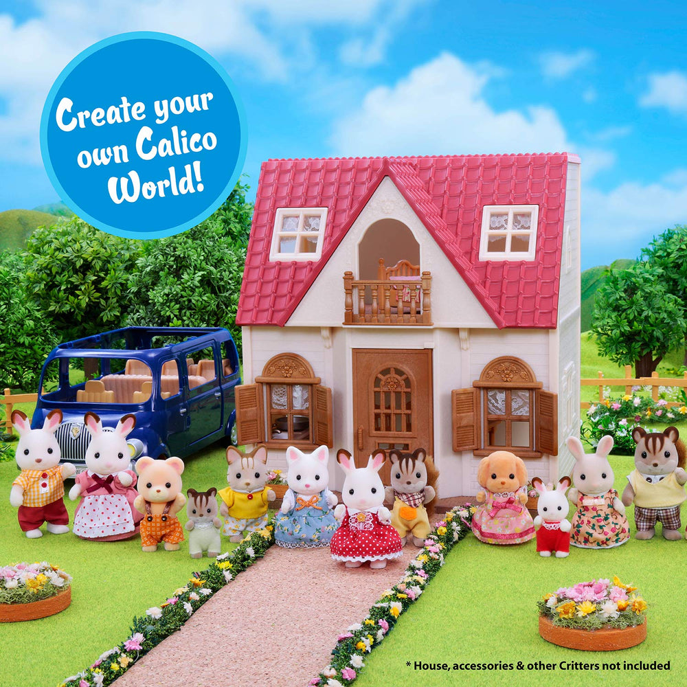 Calico Critters Persian Cat figures with removable clothing for dress-up fun.