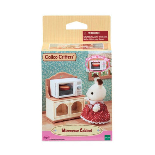 Calico Critters pie inside the microwave showcases an interactive heating feature for play.