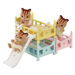 Calico Critters triple bunk beds showcase pastel pillows and duvets for cozy stories.