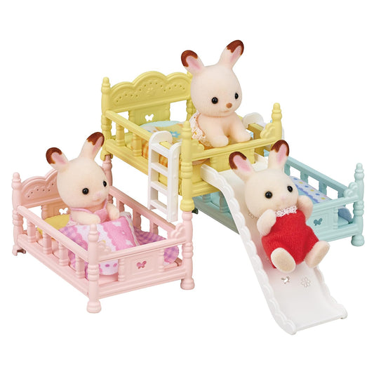 Calico Critters triple bunk beds with a slide invite dynamic, interactive play.