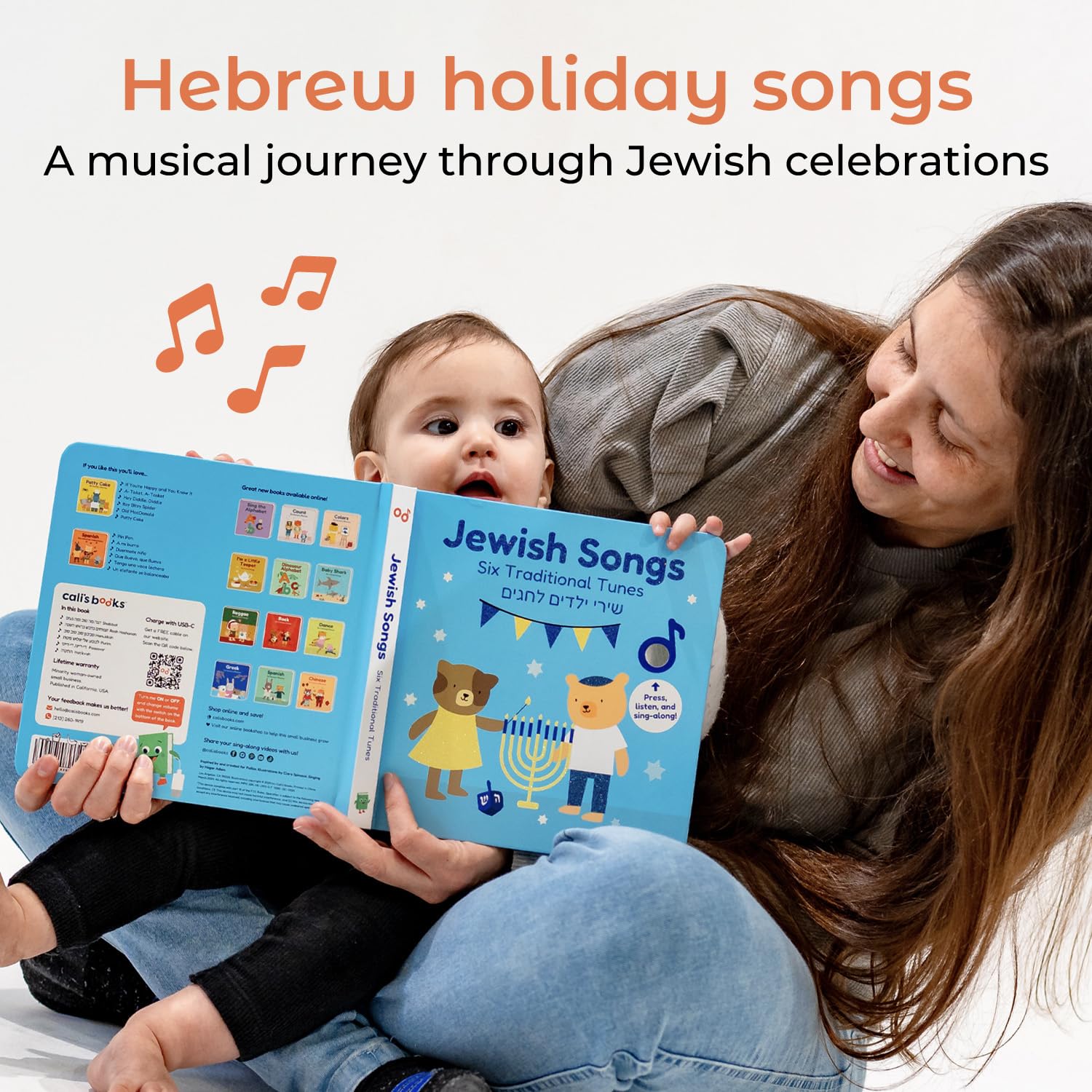 Calis Books Jewish Sound Book child pressing button for musical feedback and fine motor practice