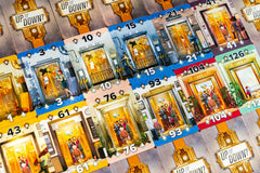 Capstone Up or Down strategy-play scene illustrates scoring via color-grouped cards.