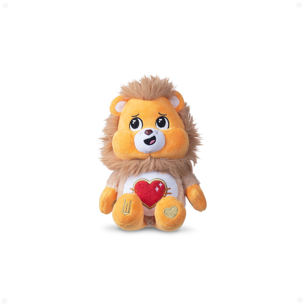 Care Bears Tenderheart Lion closeup belly badge highlights the crossover charm for fans.