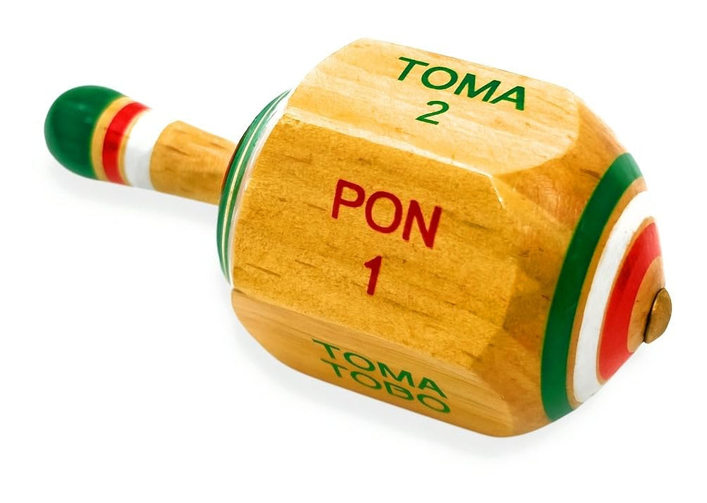 Casa De Queta pirinola traditional craft with vivid paint for celebrations.