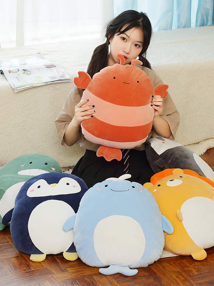 CASAGOOD penguin plush on desk adds playful comfort to a home office.
