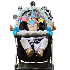 Caterbee clip-on arch attachment secures easily to stroller.