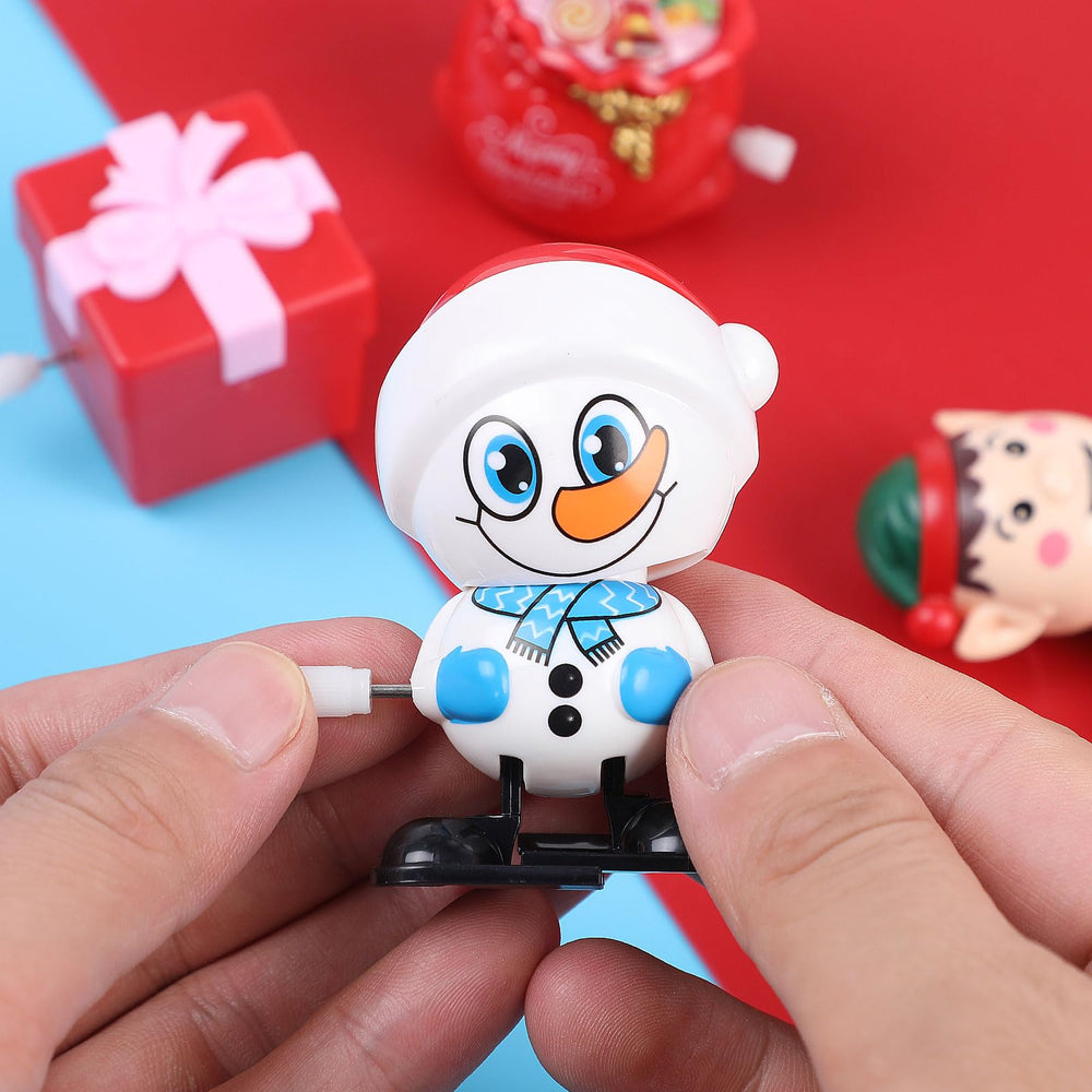 CCINEE gift box wind-up toy slides and spins, perfect stocking stuffer.
