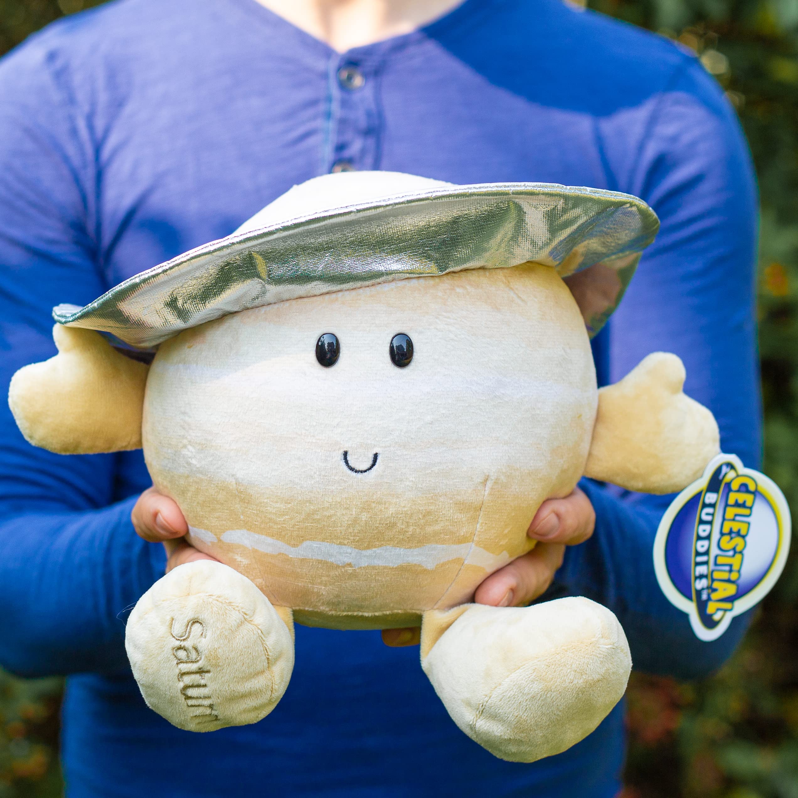 Celestial Buddies Saturn Buddy 10-inch plush is soft and huggable.