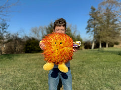 Sun Buddy in a kid's bedroom, adding a playful science-themed decor touch.