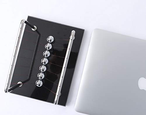 CERROPI Newton cradle detailed view reveals precise pendulum alignment.