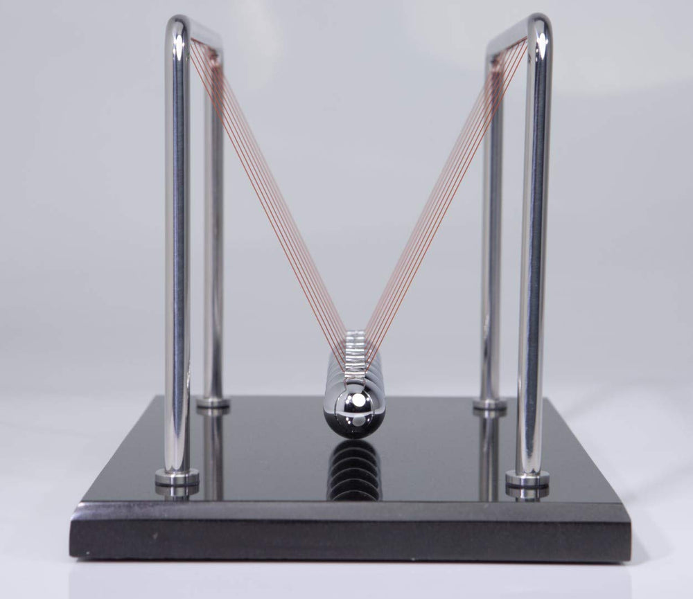 CERROPI Newton cradle in action illustrates energy transfer and play potential.