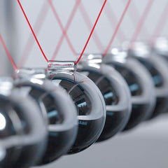 CERROPI Newton cradle balls aligned captures smooth oscillation ideal for stress-free breaks
