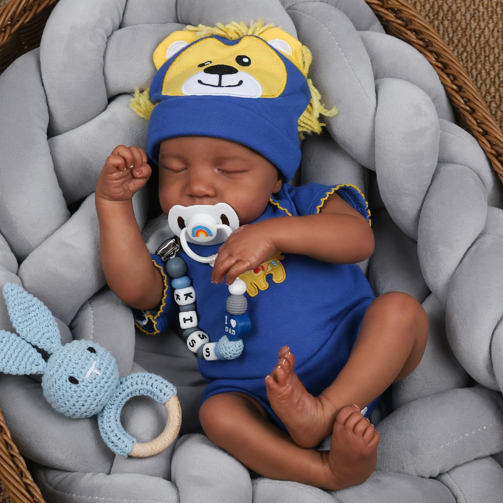 CHAREX Blue onesie, hat, and diaper outfit for a cute newborn presentation.
