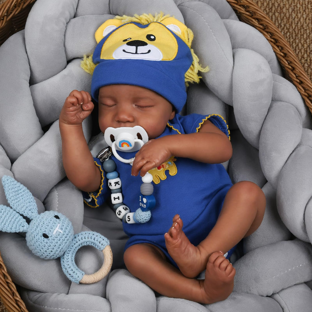 CHAREX Blue onesie, hat, and diaper outfit for a cute newborn presentation.