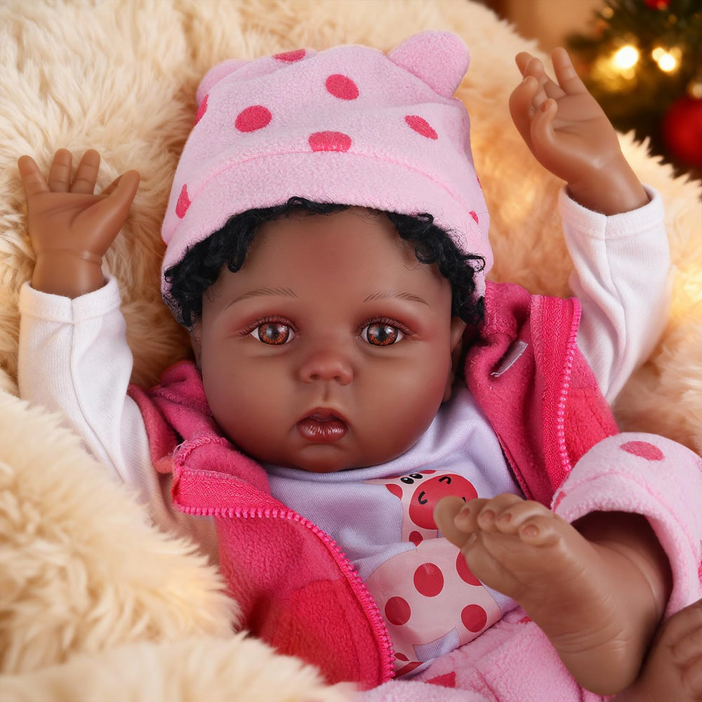 CHAREX Reborn Doll with curly black hair for tactile styling play.