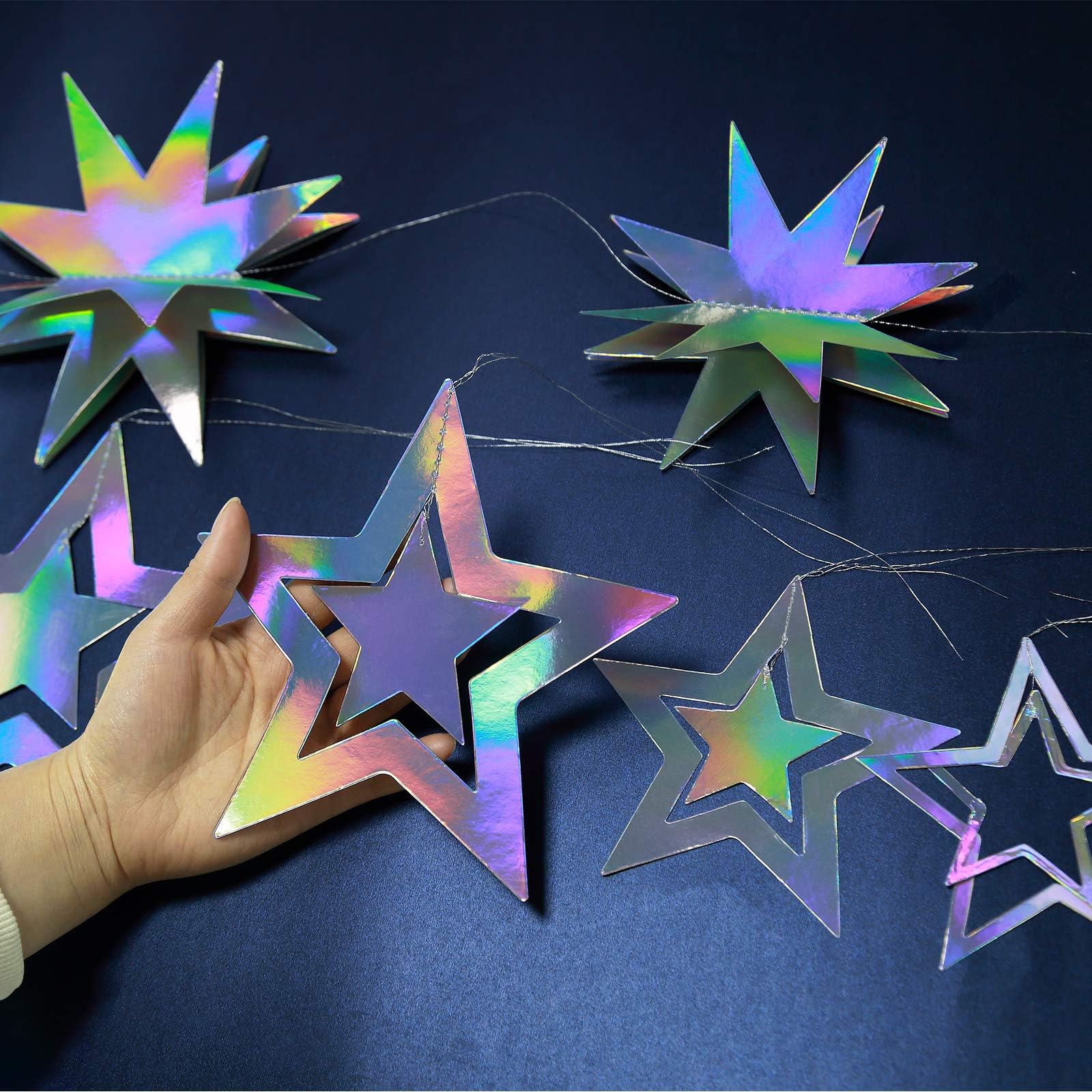 Cheerland celestial star backdrop decor enhances a party photo area
