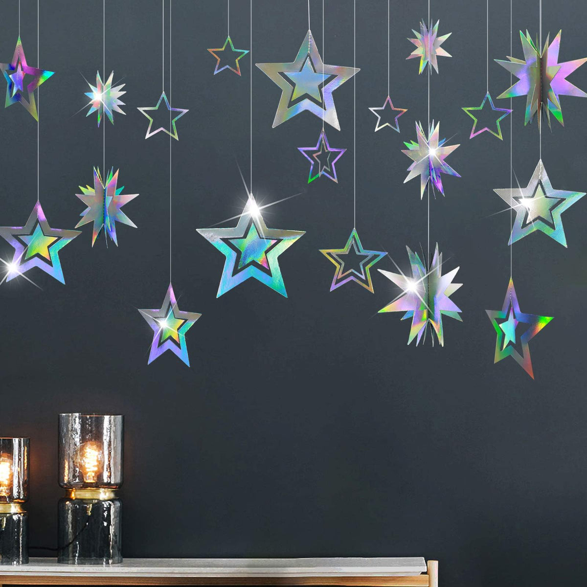 Cheerland iridescent star garland pack seen hanging from a ceiling for party decor