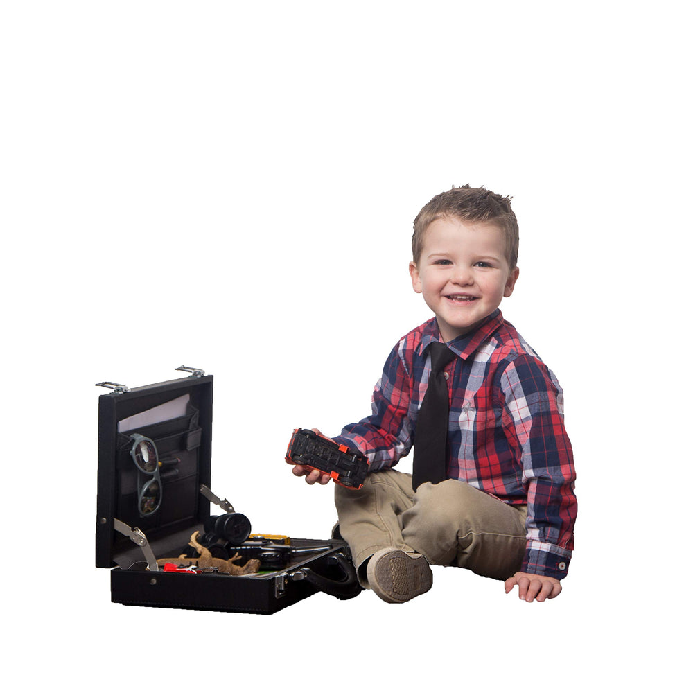 Toy inside Child Executive Officer briefcase ready for imaginative organization
