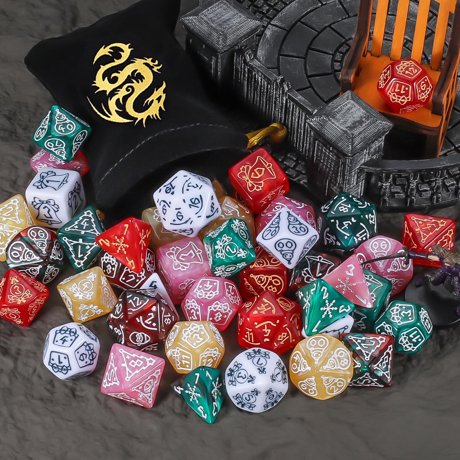 CiaraQ holiday-engraved dice featuring bells and snowflakes