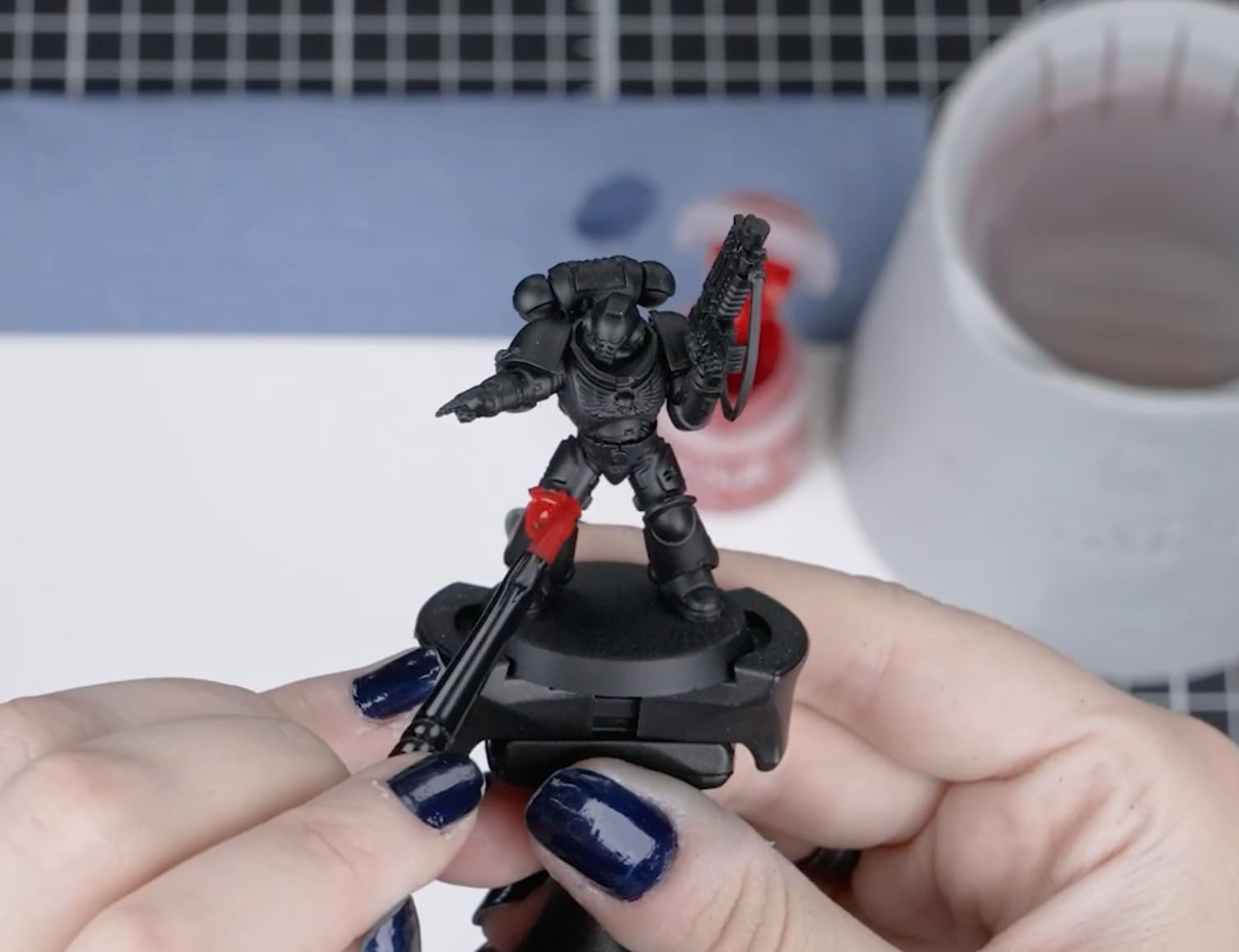 Citadel Chaos Black primer helps preserve fine details during painting.