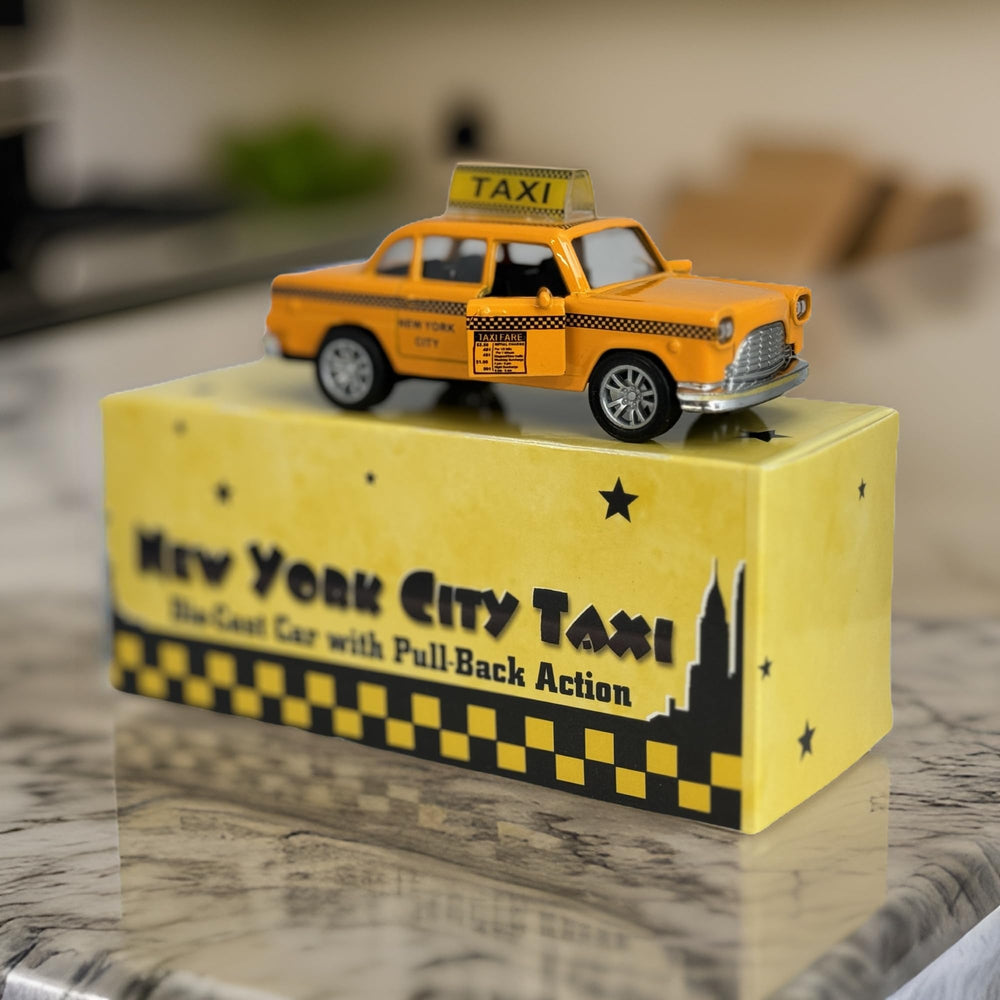 City-Souvenirs NYC Taxi front doors open for interactive playtime.