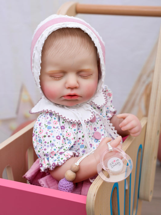Cloveray Reborn doll with bow and bonnet for dress-up
