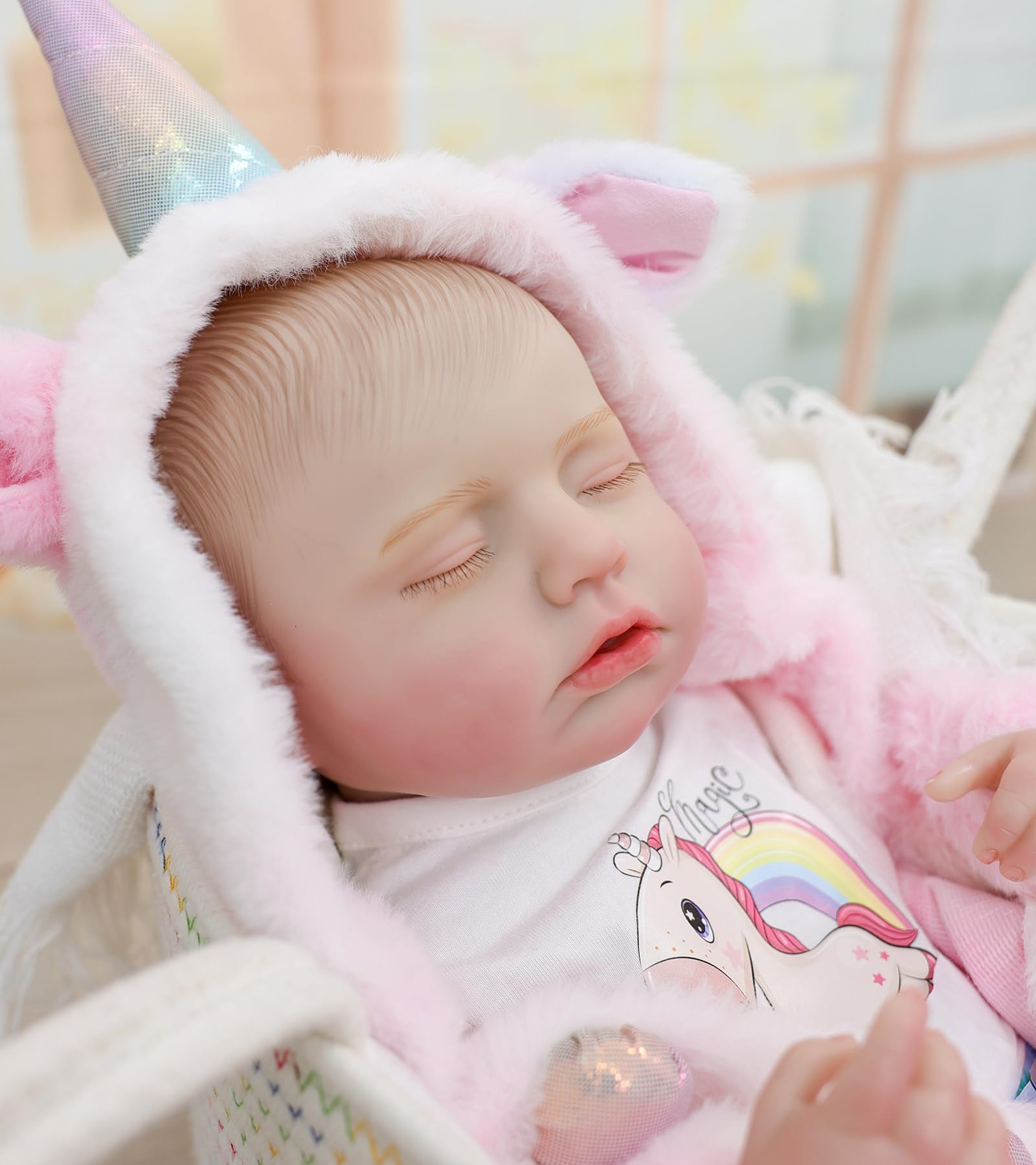 Cloveray Reborn doll hand detail shows delicate nails and subtle blush