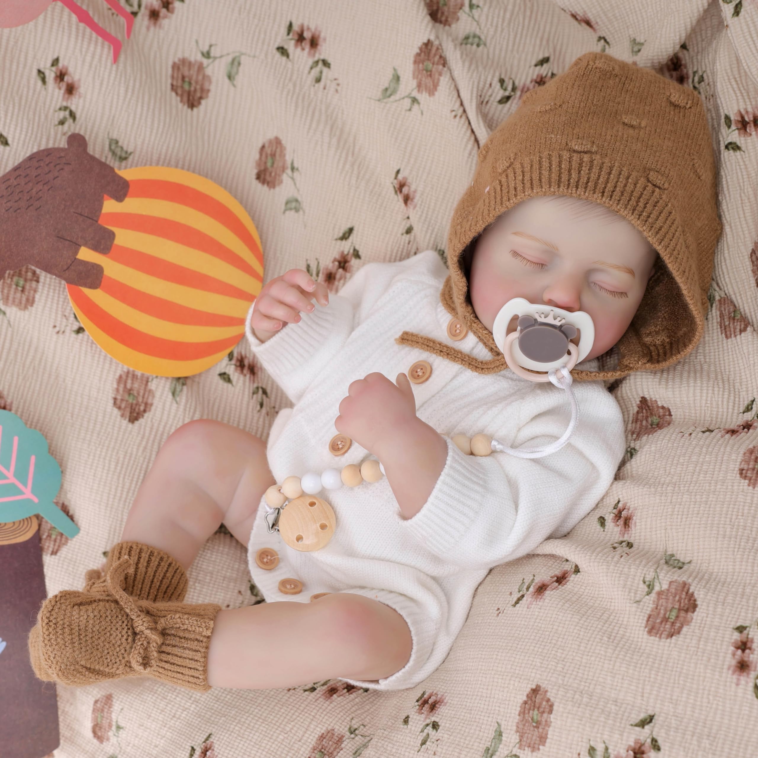Cloveray Reborn doll knit romper outfit with hat and booties.