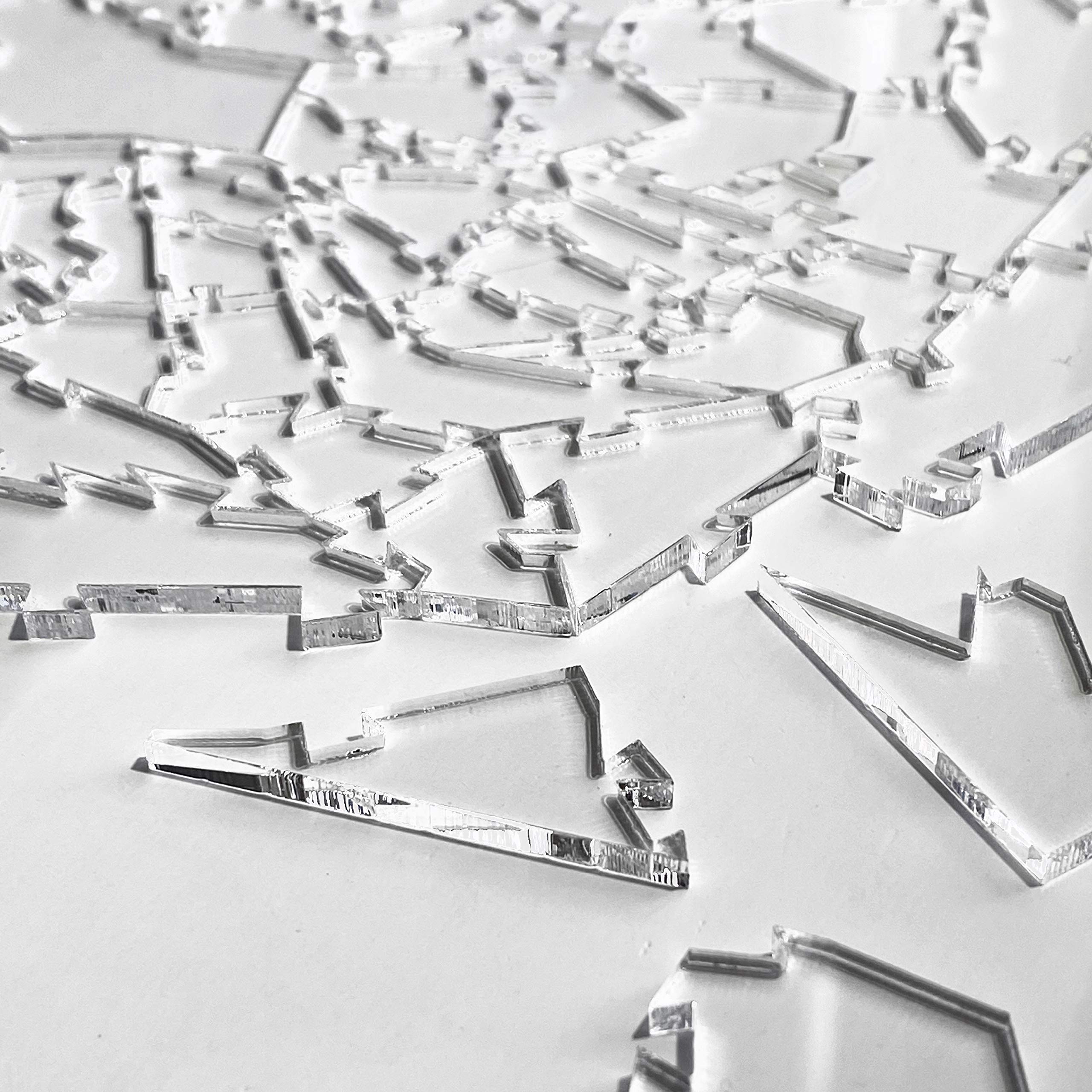 CM Originals Broken Glass Puzzle detailed pieces close-up emphasizes irregular shapes.