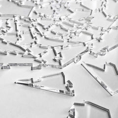 CM Originals Broken Glass Puzzle detailed pieces close-up emphasizes irregular shapes.