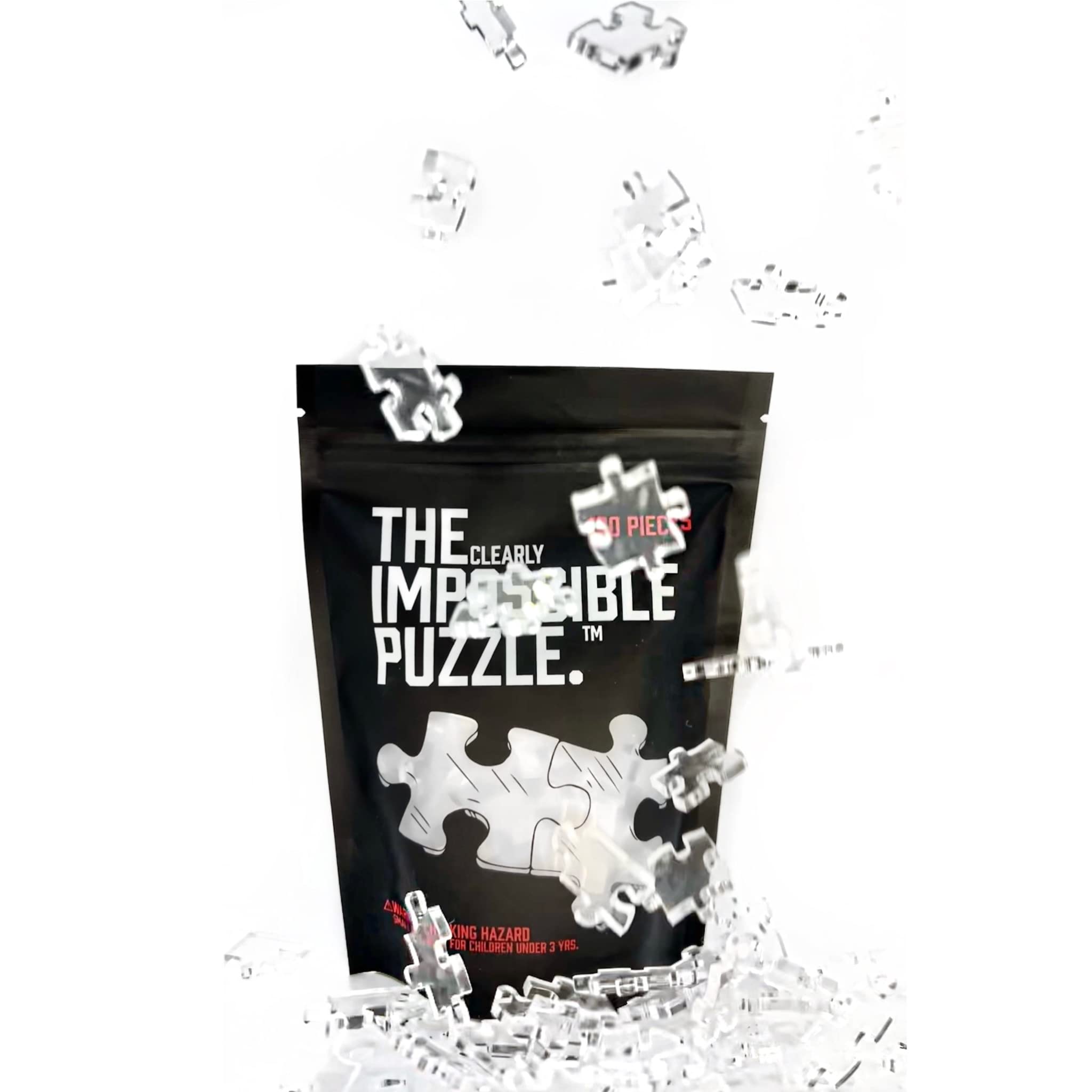 CM Originals Clearly Impossible puzzle in hand, demonstrates the 18.75 by 11 inch size.