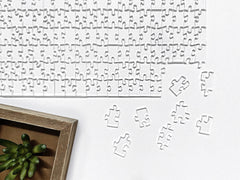 CM Originals Clearly Impossible Puzzle weight shown, conveying sturdy, premium construction.