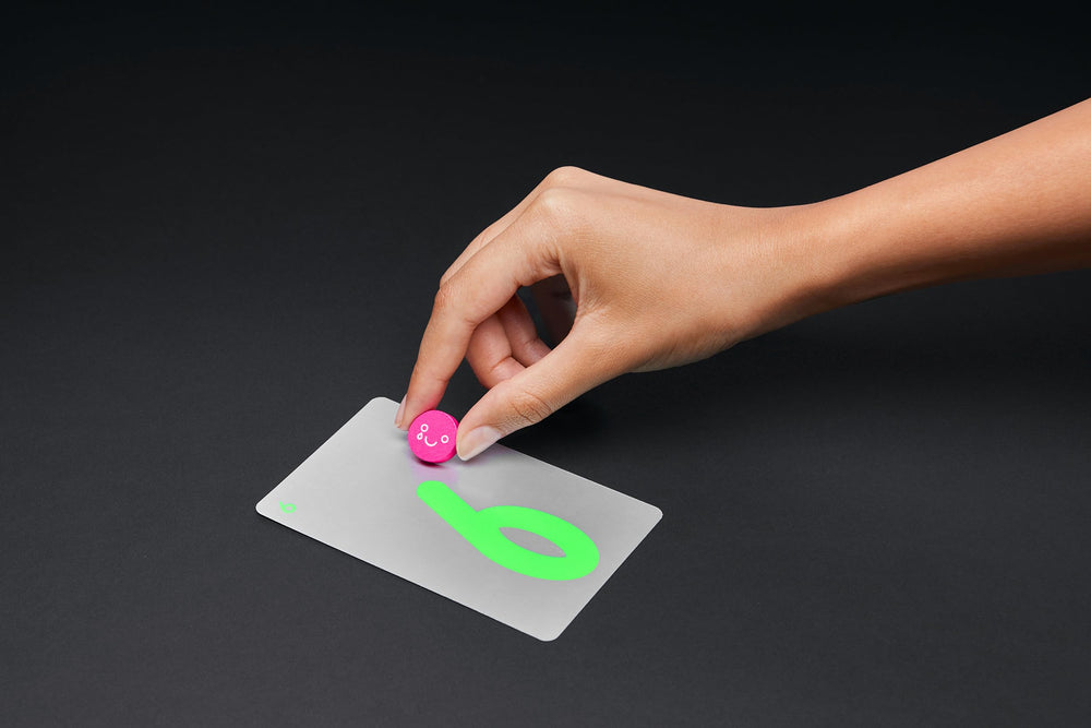 CMYK No Thanks! Magenta Edition close-up of cards conveys tactile quality for game night.
