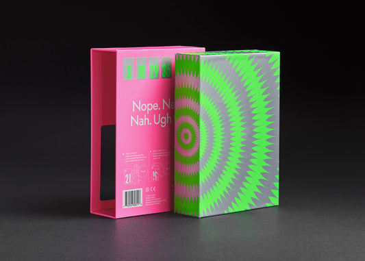 CMYK No Thanks! Magenta Edition play area with cards, ideal for quick social games.