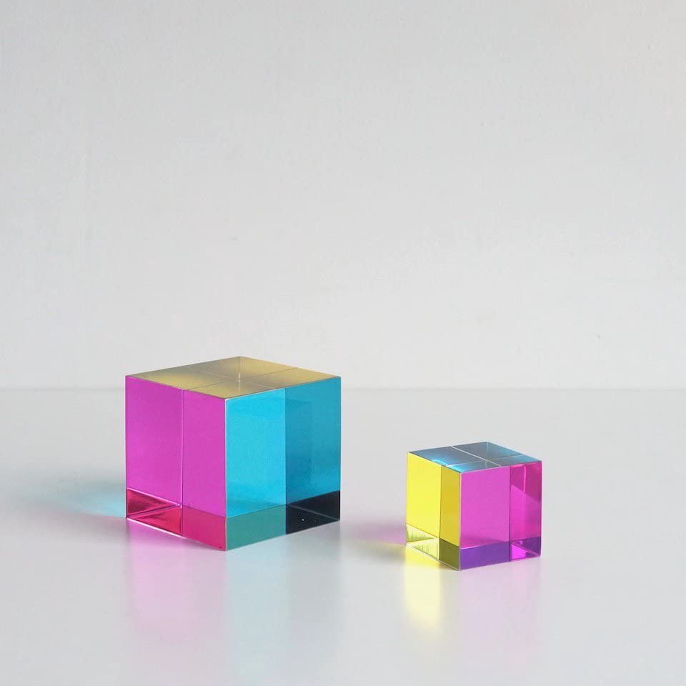 CMY Cubes Original 50mm twisting colors illustrating dynamic color interactions.