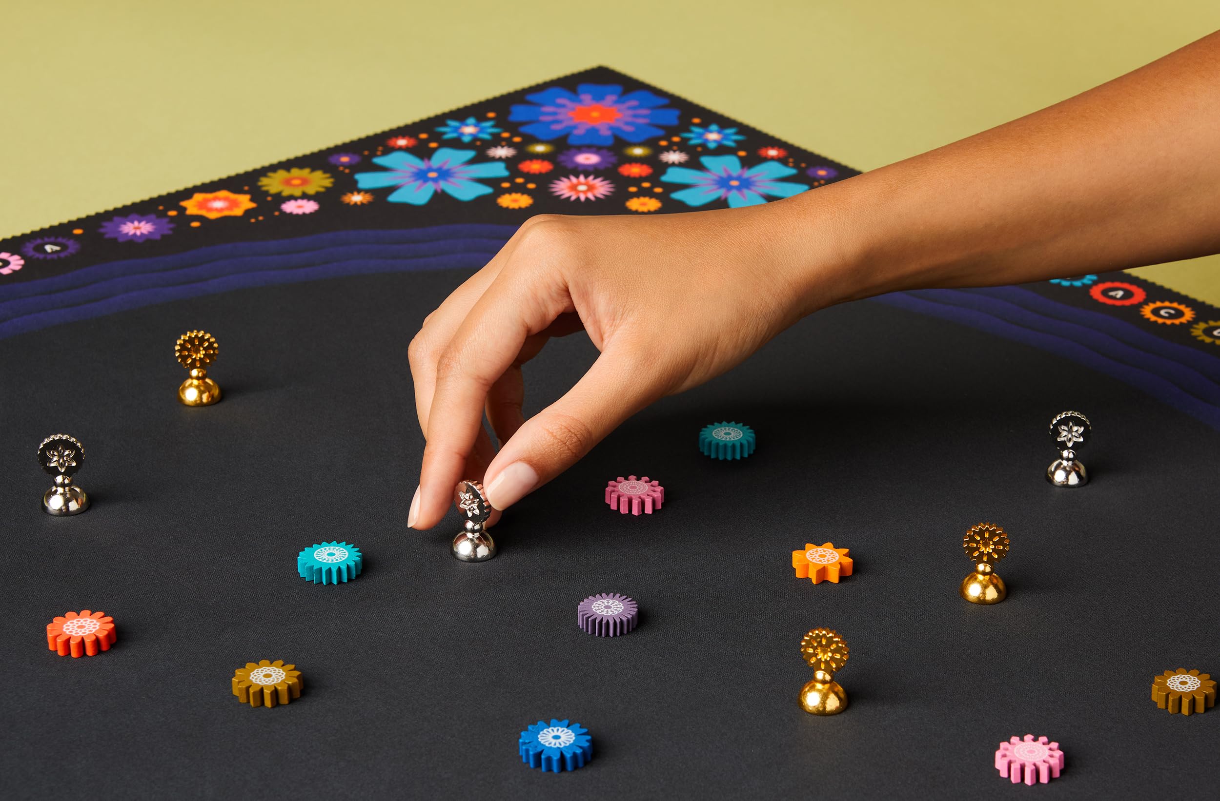 CMYK Lacuna flower icons illustrate colorful scoring opportunities.