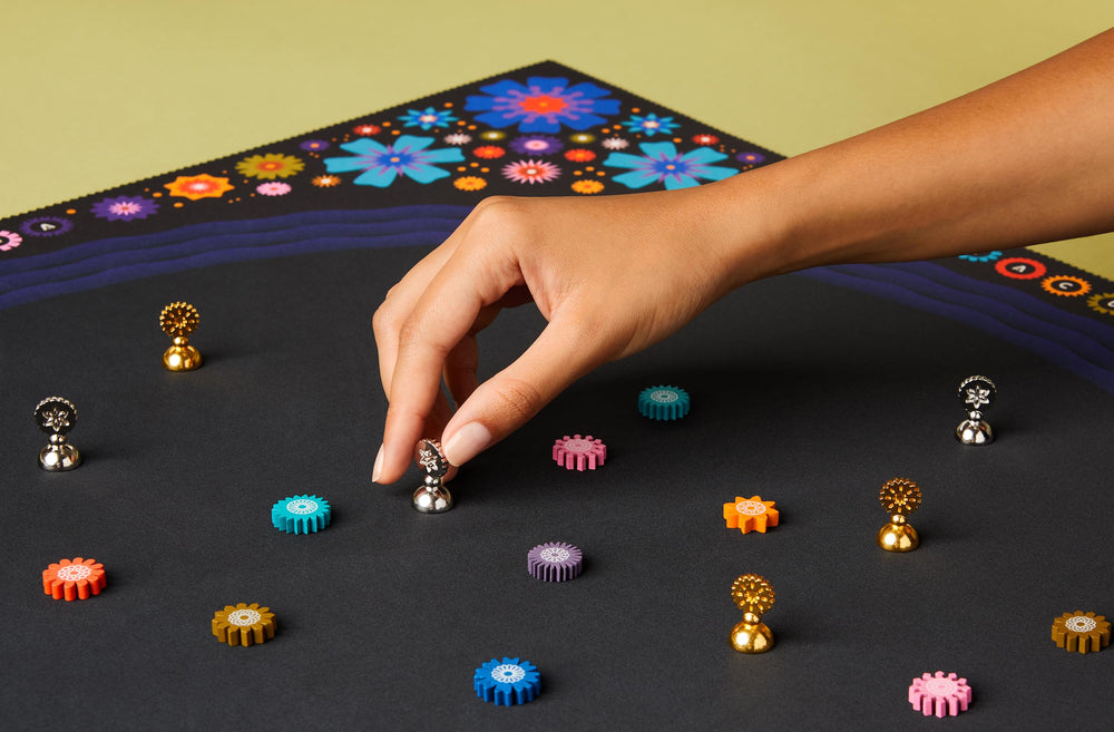 CMYK Lacuna flower icons illustrate colorful scoring opportunities.