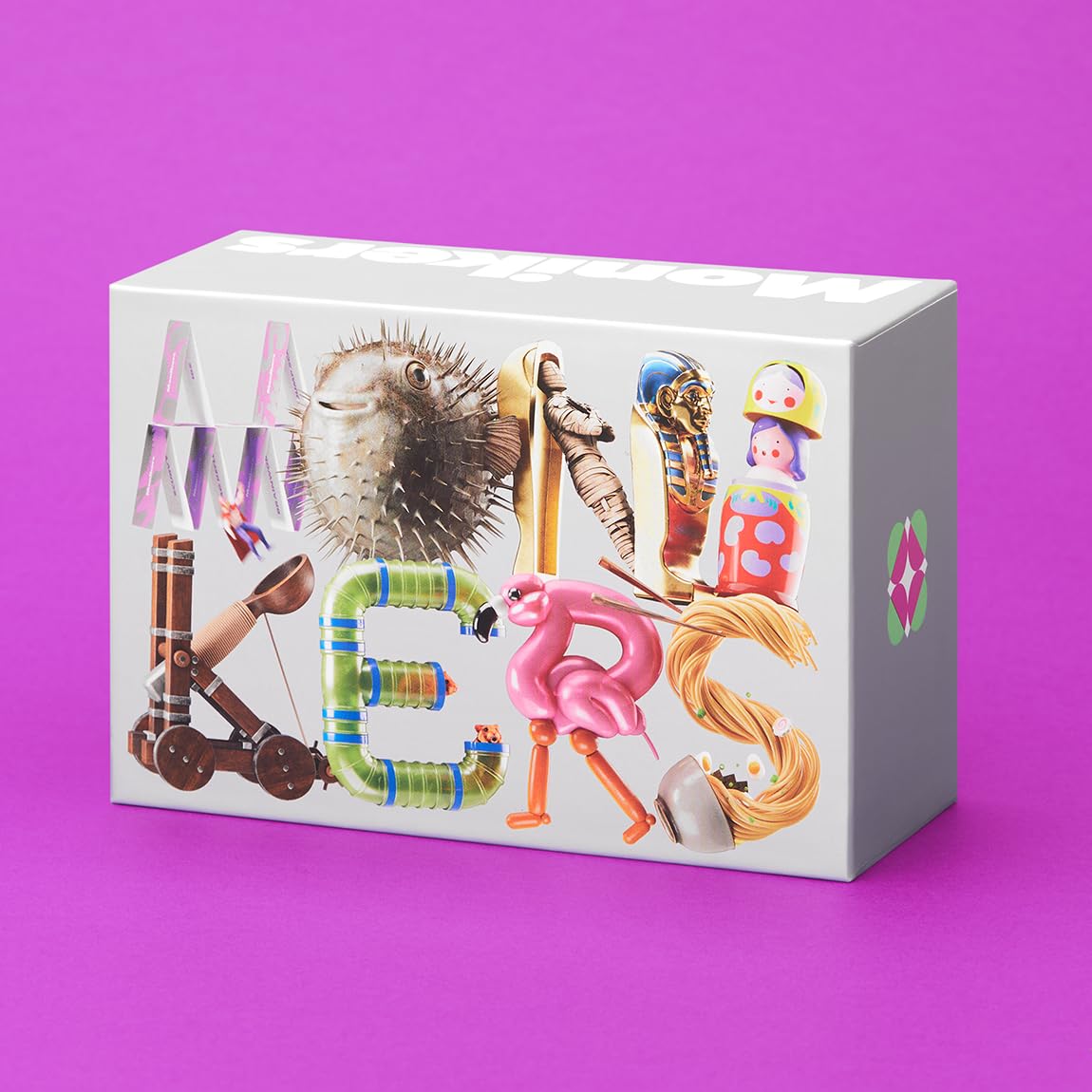 CMYK Monikers card deck closeup emphasizes clues for funny inside jokes.
