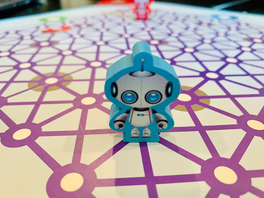 CoderMindz AI Learner Game robot figure aiding hands-on exploration.