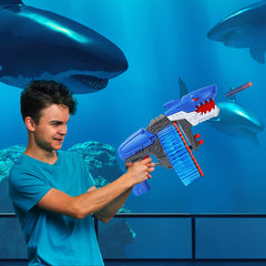 ColdFire kid playing indoors with shark-themed toy gun for family fun.