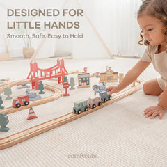 Comfy Cubs town signs and railway scene spark storytelling adventures.